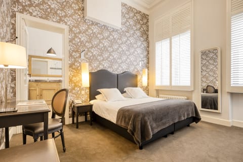 Executive Room | Premium bedding, in-room safe, individually decorated