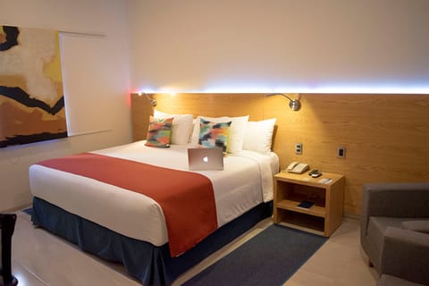 Suite, 1 King Bed | Premium bedding, down comforters, in-room safe, individually decorated