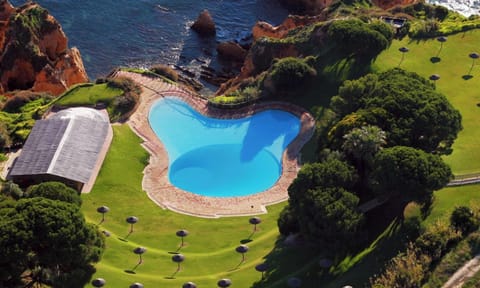 Seasonal outdoor pool, pool umbrellas, sun loungers