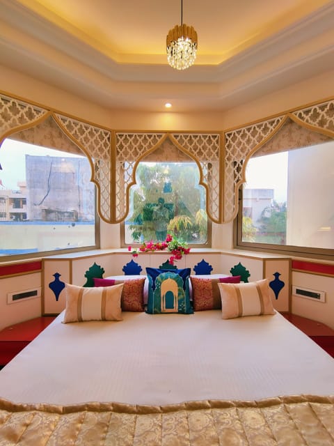 Mughal heritage room with 180 degree city view from Designer bed | Egyptian cotton sheets, premium bedding, memory foam beds, minibar