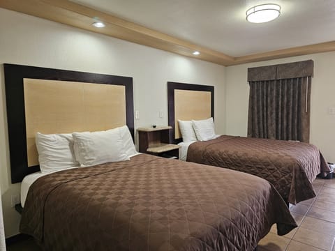 Deluxe Double Room, 2 Queen Beds | Desk, iron/ironing board, free WiFi, bed sheets