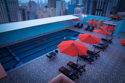 Outdoor pool, open 9 AM to 6 PM, sun loungers
