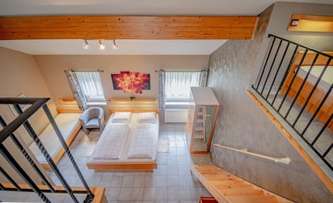 Family Room | Minibar, desk, cribs/infant beds, free WiFi