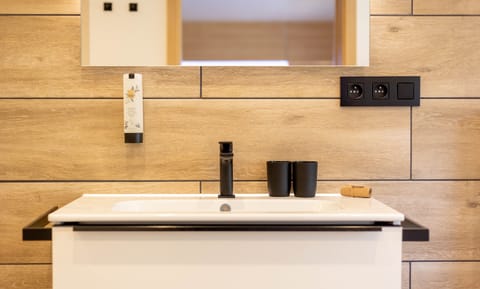 Shower, free toiletries, hair dryer, bathrobes