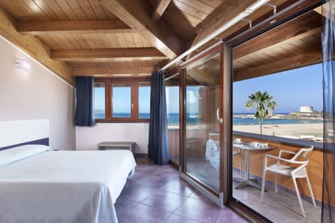 Deluxe Double or Twin Room, Sea View | Minibar, in-room safe, desk, free WiFi