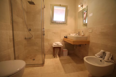 Junior Suite, Terrace (La Forza) | Bathroom | Free toiletries, hair dryer, slippers, towels