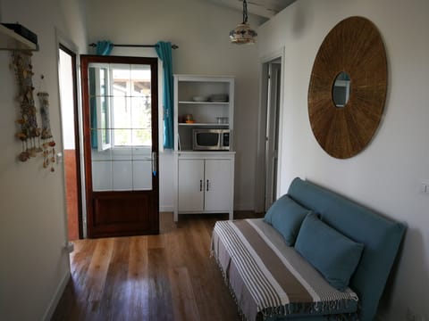 Family Cottage, 1 Bedroom, Accessible, Garden View (Romeo) | Blackout drapes, iron/ironing board, free WiFi, bed sheets