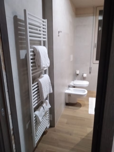 Double or Twin Room | Bathroom | Shower, hair dryer, bidet, towels