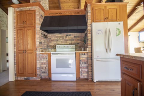 The Chalet Suite | Private kitchen | Microwave, coffee/tea maker