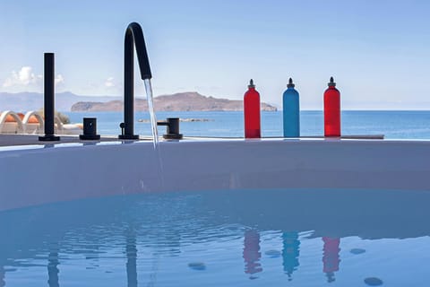 Suite, 1 Bedroom (Wellness Loft, Pool View Out. Heated Jacuzzi) | Pool | Indoor pool, 2 outdoor pools, pool umbrellas, sun loungers