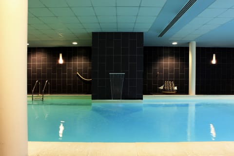 Indoor pool, open 7:00 AM to 9:00 PM, sun loungers