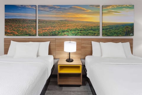 Desk, laptop workspace, blackout drapes, iron/ironing board