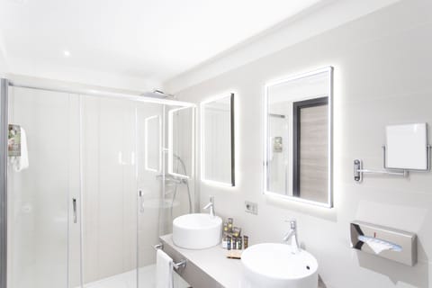 Shower, rainfall showerhead, eco-friendly toiletries, hair dryer