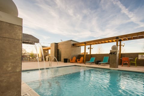 Seasonal outdoor pool, open 7:00 AM to 11:00 PM, sun loungers