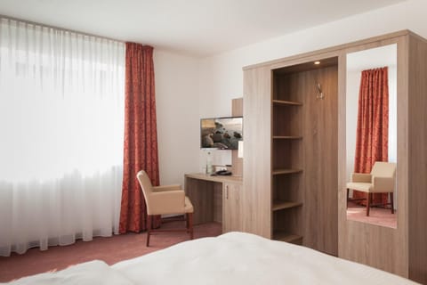 In-room safe, desk, blackout drapes, free cribs/infant beds