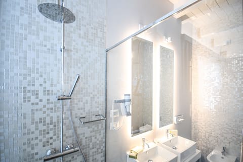 Shower, eco-friendly toiletries, hair dryer, slippers