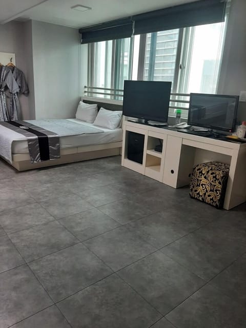 Family Room, Kitchen, Parking, Non Smoking, City View | Desk, laptop workspace, blackout drapes, free WiFi