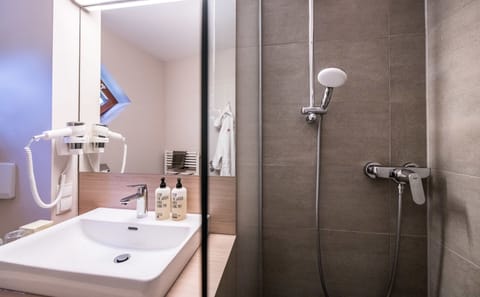 Bathroom | Shower, free toiletries, hair dryer, towels