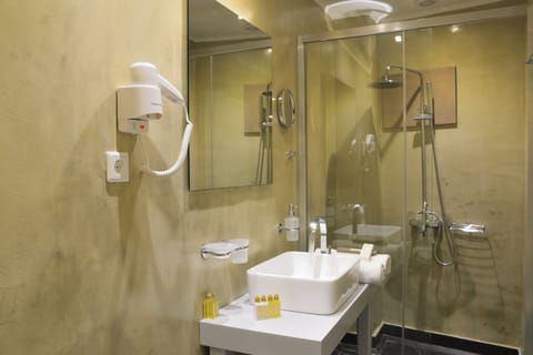 Shower, free toiletries, hair dryer, slippers