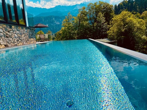 2 outdoor pools, sun loungers