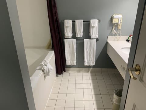 Standard Room, 2 Queen Beds, City View | Bathroom | Combined shower/tub, free toiletries, hair dryer, towels