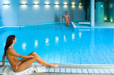 Indoor pool, open 7:00 AM to 11:00 PM, sun loungers