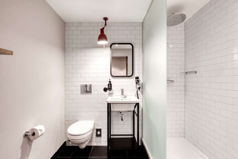 Shower, rainfall showerhead, designer toiletries, hair dryer