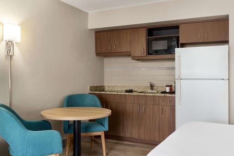 Desk, blackout drapes, iron/ironing board, free cribs/infant beds