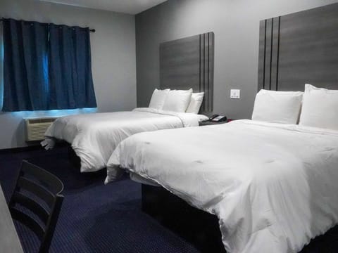 Suite, 2 Queen Beds, Non Smoking | Individually decorated, individually furnished, desk, soundproofing