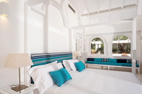 Classic Suite, Terrace, Pool View | Minibar, in-room safe, desk, blackout drapes