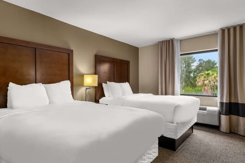 Suite, Multiple Beds, Non Smoking | Laptop workspace, iron/ironing board, free WiFi, bed sheets