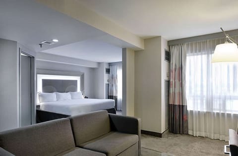 Junior Suite, 1 King Bed | Living area | LCD TV