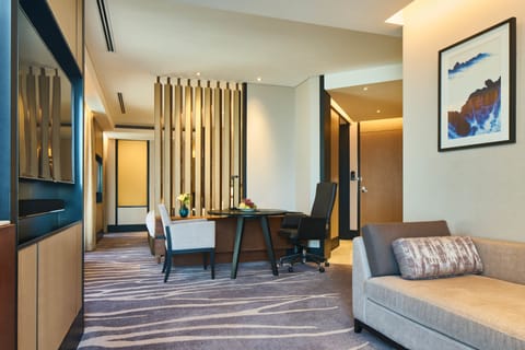 1 King Junior Suite | Living area | 48-inch LCD TV with cable channels, TV