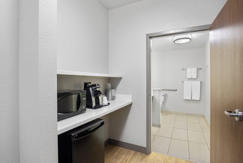 Suite, 1 King Bed, Accessible (Communications) | In-room safe, desk, blackout drapes, iron/ironing board