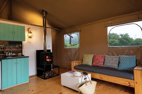 Luxury Tent, 2 Bedrooms | Living area | Fireplace