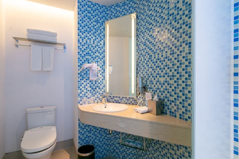 Family Room (Free Breakfast) | Bathroom | Shower, hair dryer, slippers, towels