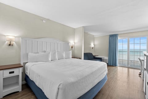 Desk, laptop workspace, blackout drapes, iron/ironing board