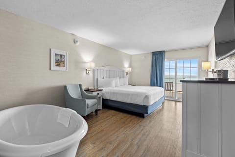 Beach View Walkout King with Spa | Desk, laptop workspace, blackout drapes, iron/ironing board
