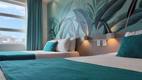 Family Triple Room | Bed sheets