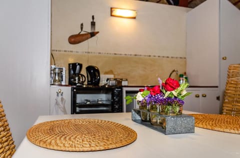 Fridge, stovetop, coffee/tea maker, cookware/dishes/utensils