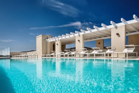 Outdoor pool, a rooftop pool, sun loungers