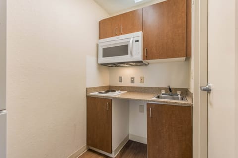 Full-size fridge, microwave, dining tables