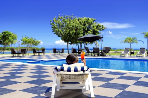 Outdoor pool, pool umbrellas, sun loungers