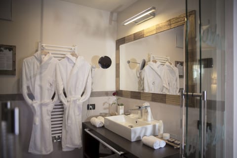 Premium bedding, down comforters, Select Comfort beds, minibar