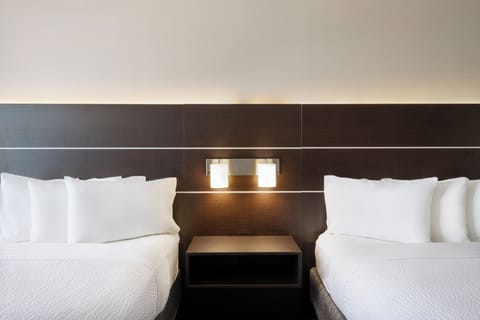 Standard Room, 2 Queen Beds | Blackout drapes, iron/ironing board, free cribs/infant beds, free WiFi