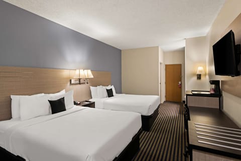 Room, 2 Queen Beds, Non Smoking | In-room safe, desk, blackout drapes, rollaway beds