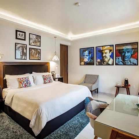 Deluxe King Room | Premium bedding, down comforters, in-room safe, individually decorated