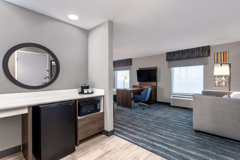 Desk, laptop workspace, blackout drapes, iron/ironing board