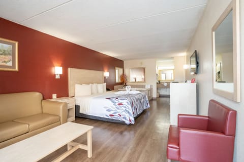 Desk, laptop workspace, blackout drapes, iron/ironing board