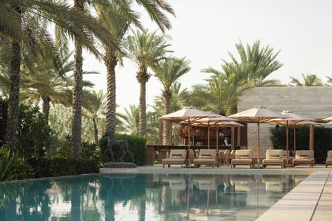 Outdoor pool, pool umbrellas, sun loungers